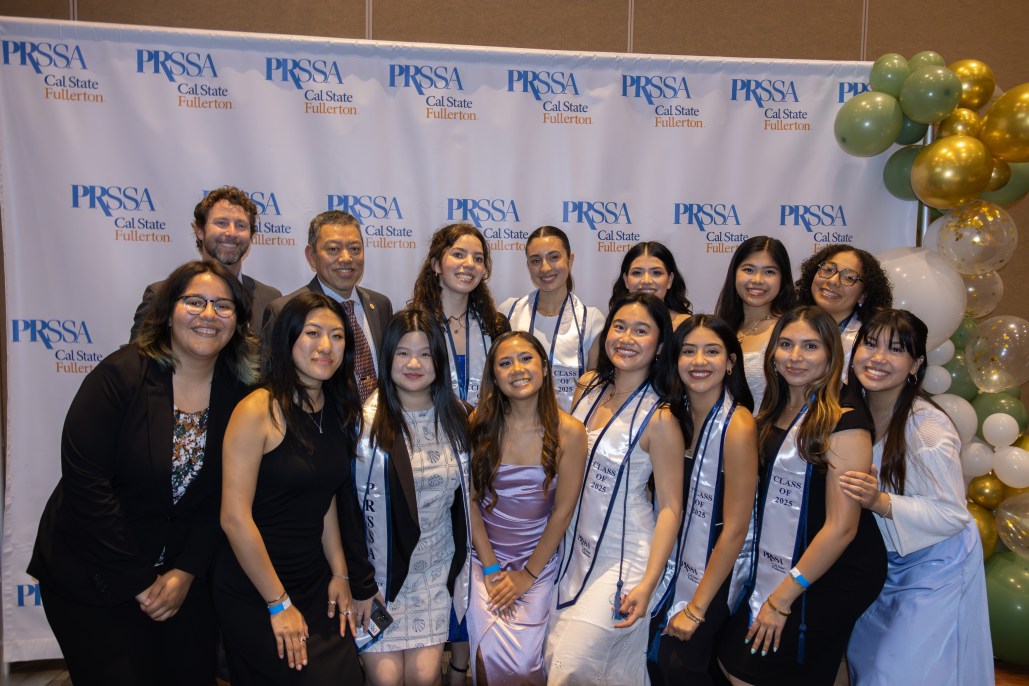 CSUF PRSSA students and advisers posing together at the 2025 gala