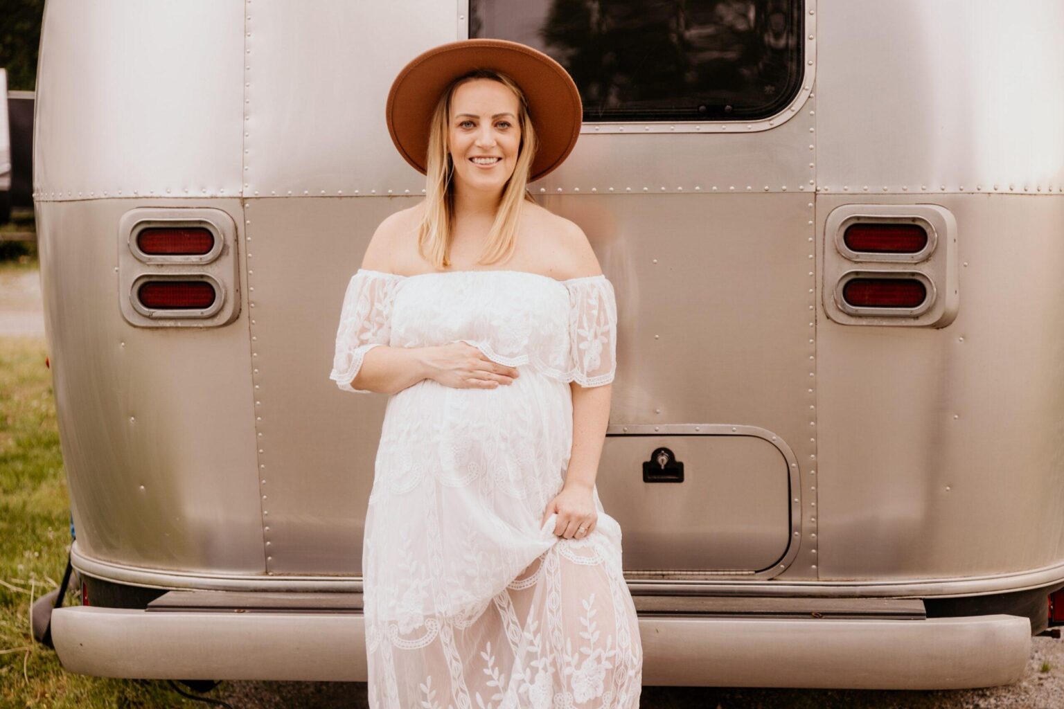 Heather Holmes standing in front of the Airstream from which she ran Publicity For Good