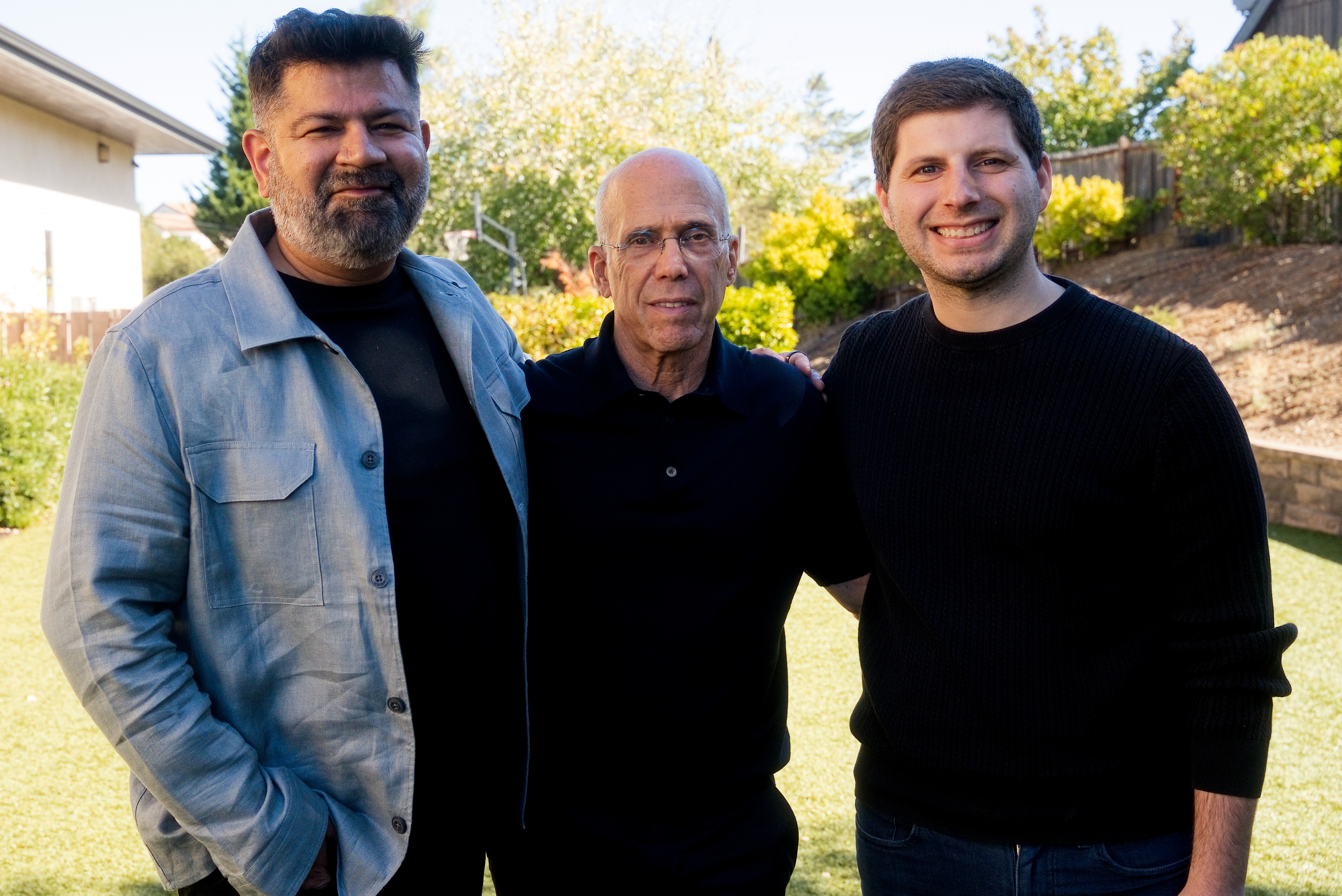 Puneet Mehta, Jeffrey Katzenberg, and Justin Wexler standing together outdoors