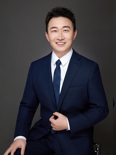QuantGroup founder Hao Zhou wearing a navy suit