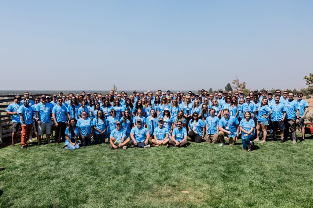 Quavo employees gathered outdoors at Camp Quavo