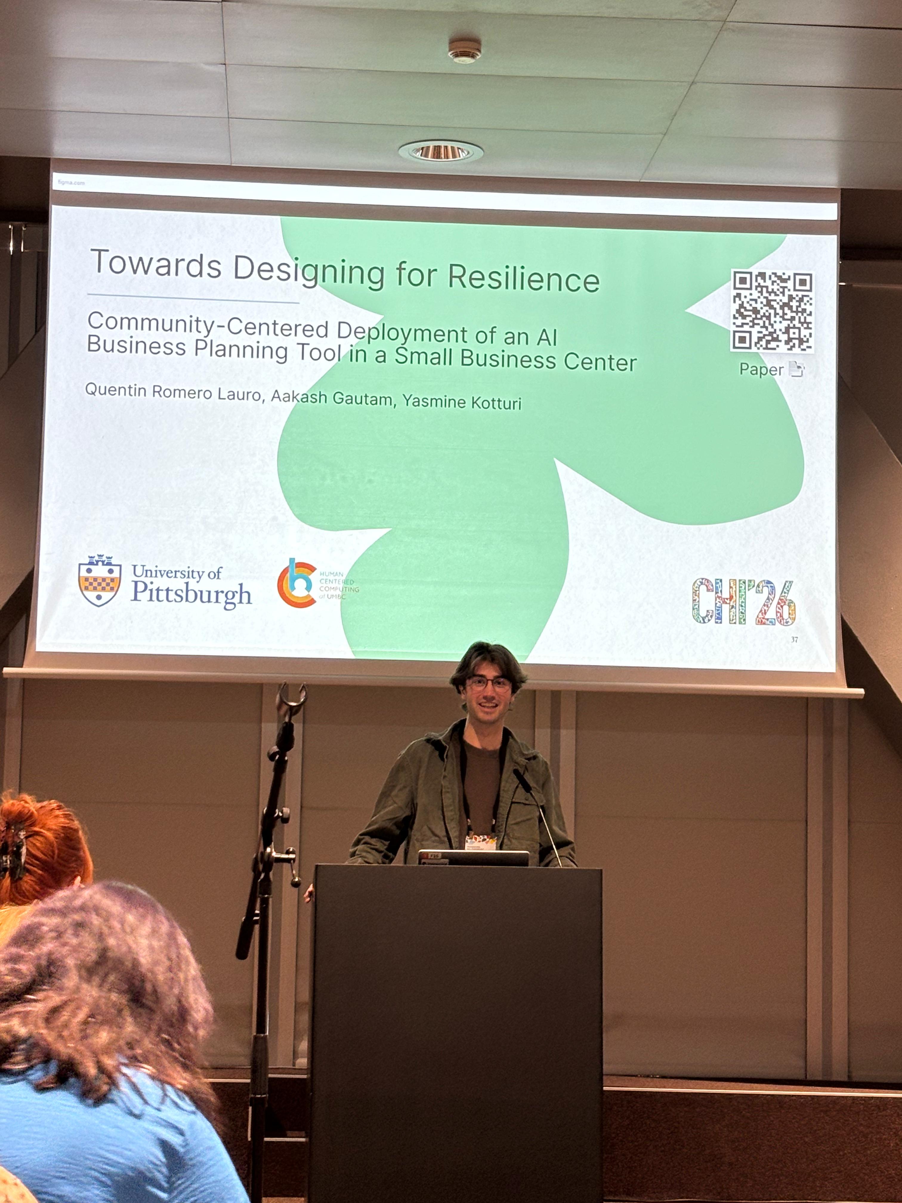 Quentin Romero Lauro presenting the BizChat research at CHI 2026 in Barcelona