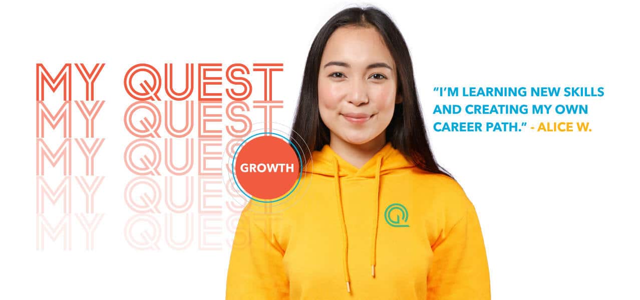 Quest Analytics recruitment photograph of employee Alice W. wearing a yellow company sweatshirt