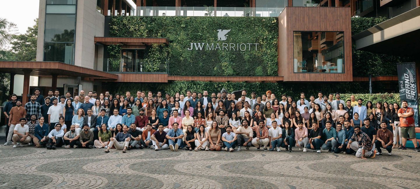 Qure.ai team gathered outside during a company offsite