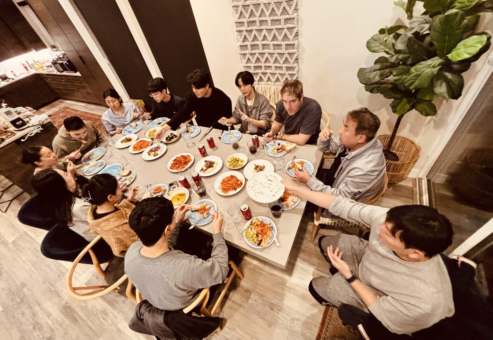 Desert Rose participants sharing a meal around a large table