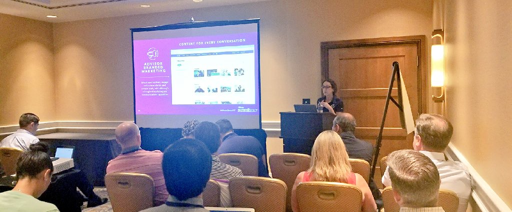 Rachel Eccles presenting Advisor Branded Marketing to a seated audience at the 2017 eMoney Summit