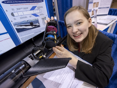 Rachel Seevers with her jellyfish-inspired underwater propulsion device at Intel ISEF 2019