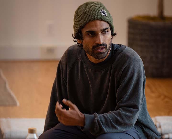 Raed Khawaja speaking inside Open's warm, wood-toned Venice studio