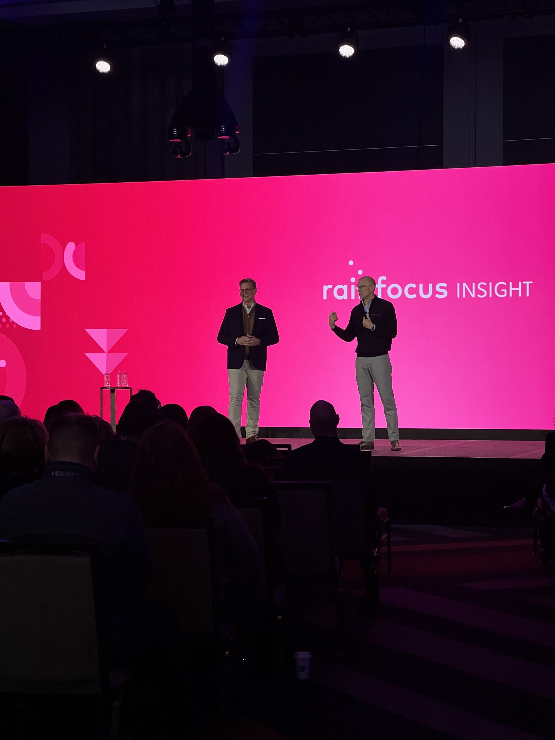 Doug Baird and JR Sherman speaking on the RainFocus INSIGHT stage
