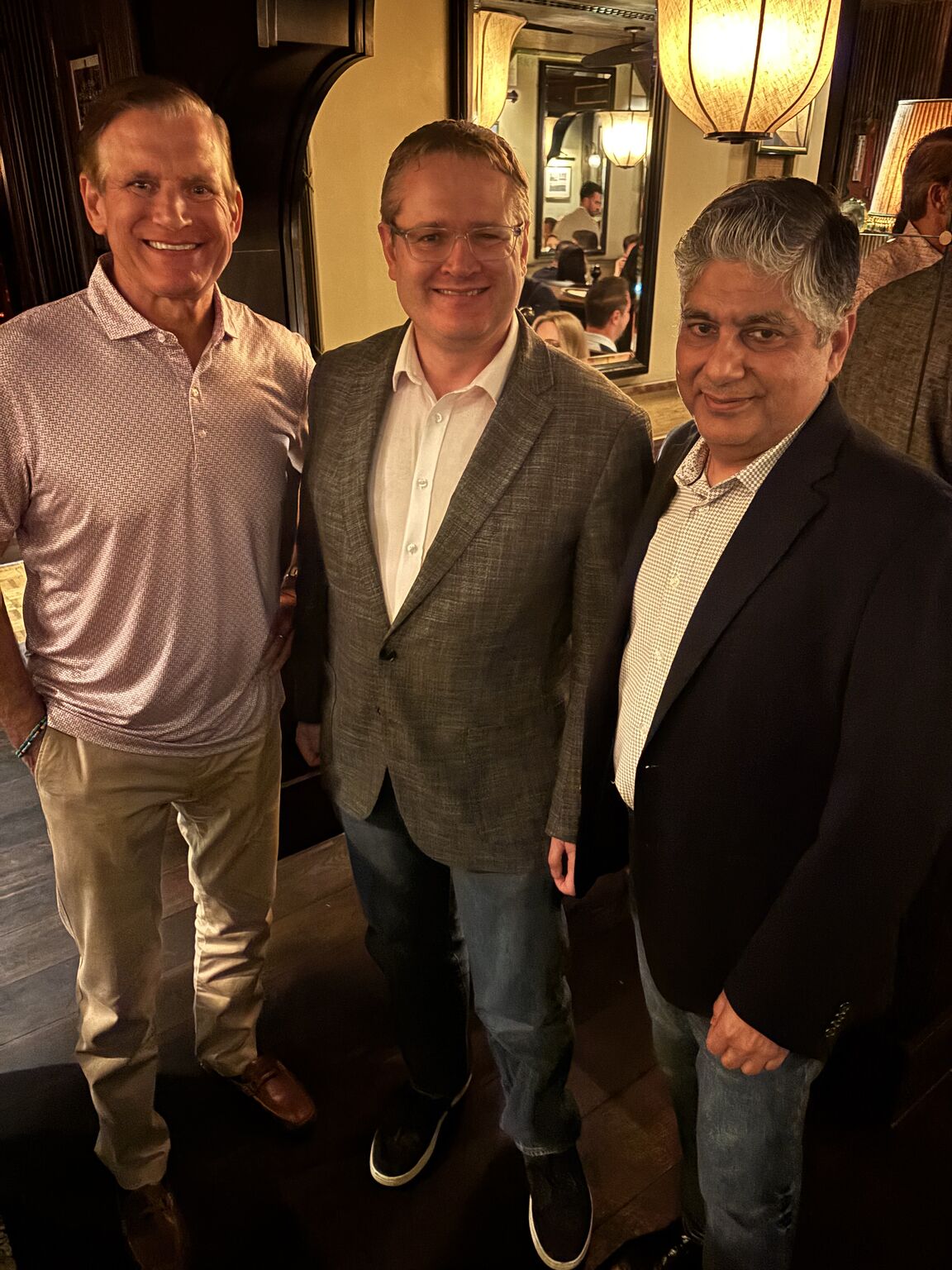 Raj Gidvani, right, with two technology colleagues at a London dinner