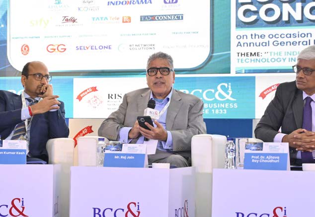 Raj Jain speaking into a microphone during a Bengal Chamber of Commerce and Industry panel