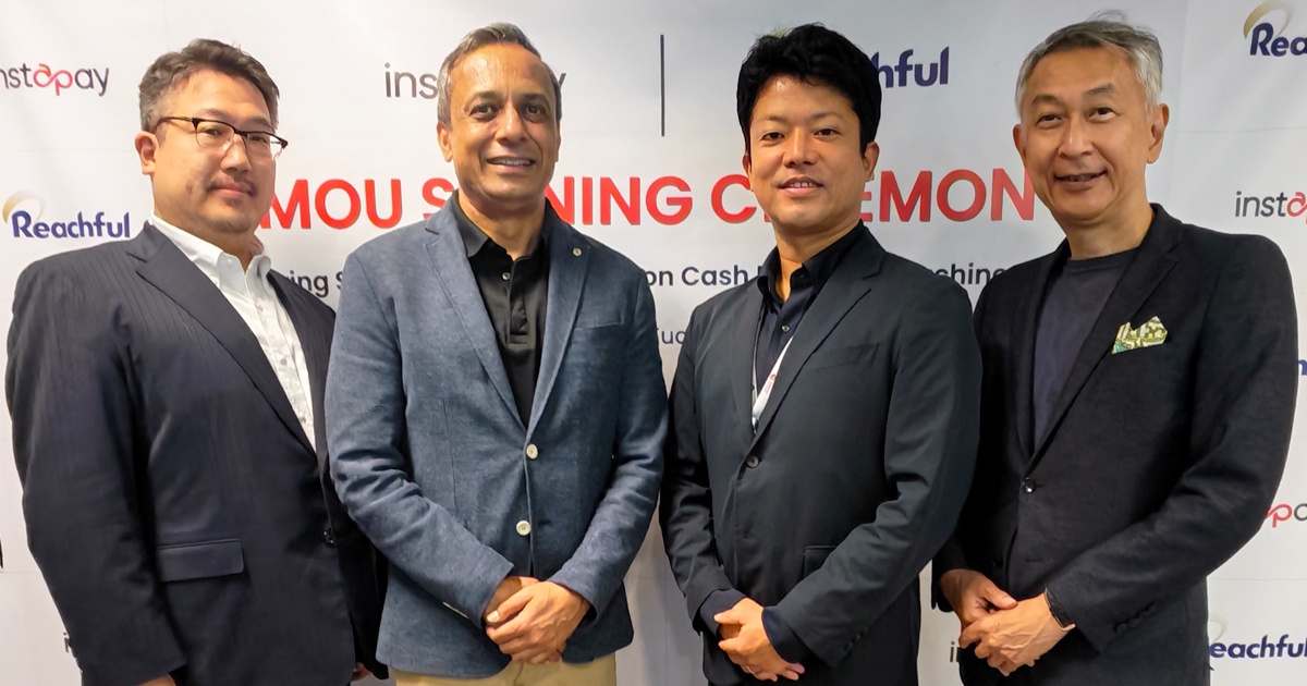 Rajnish Kumar, second from left, with participants at the Instapay and Reachful memorandum signing ceremony