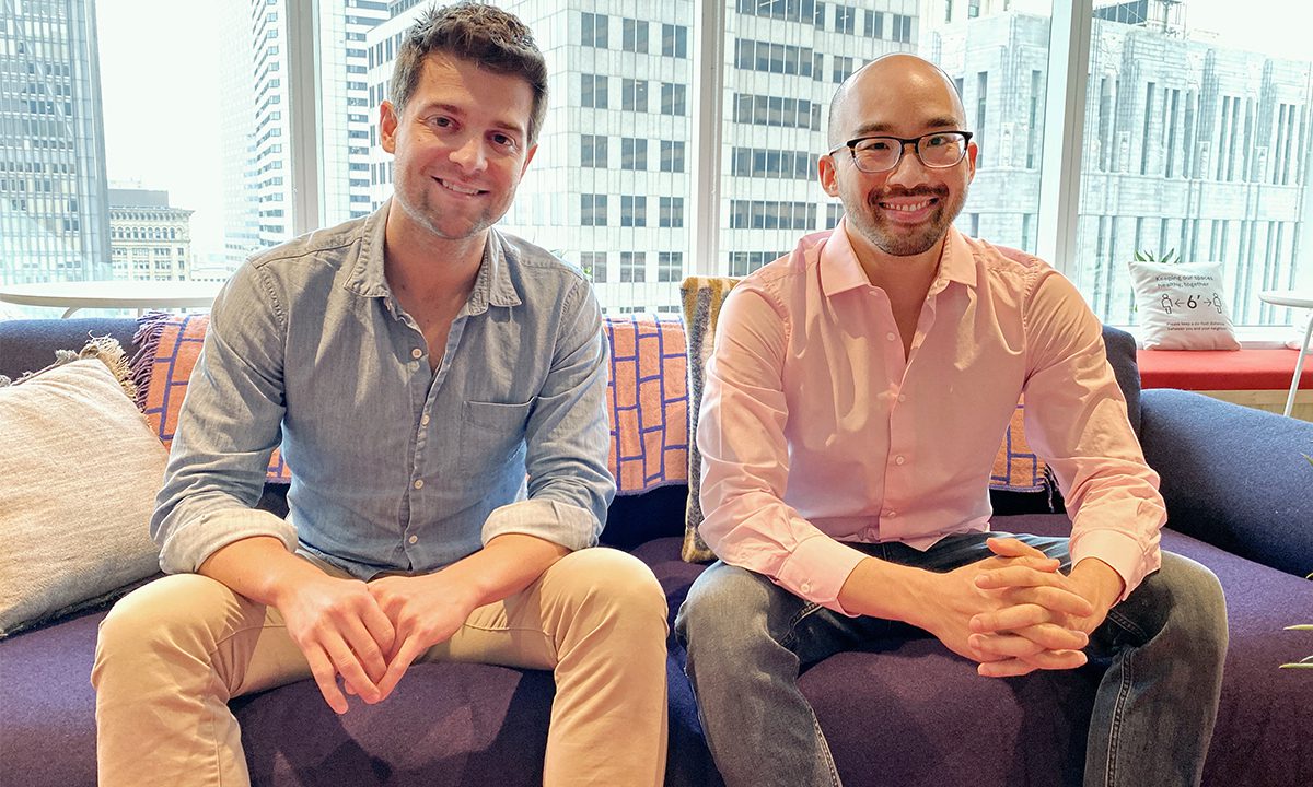 Ralph Passarella, left, and Reify Health co-founder Michael Lin seated together in an office
