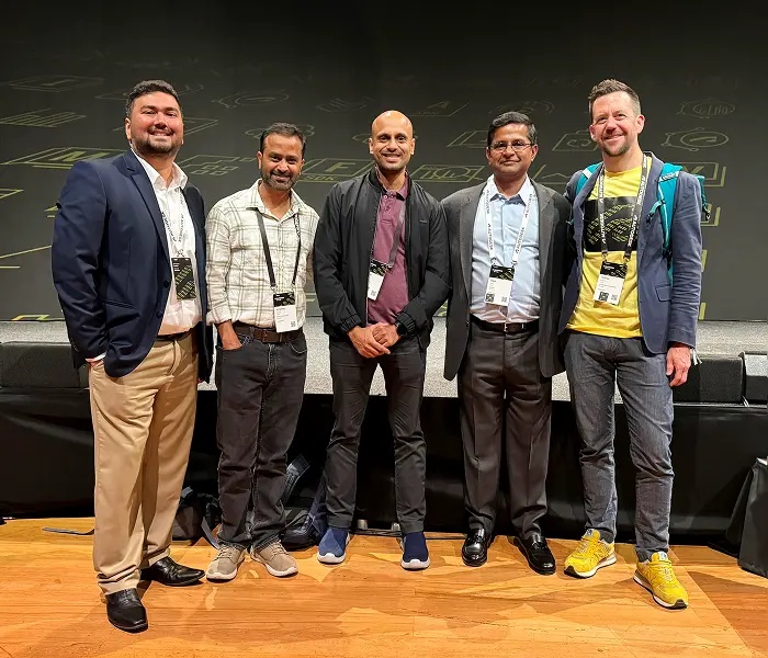 Five conference attendees pose together at Autodesk DevCon 2025; Ram Hari stands second from right.