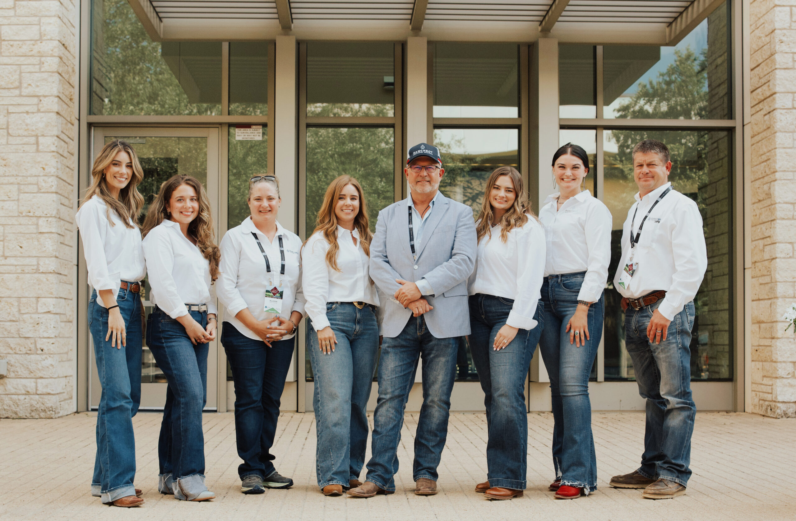 Ranchbot team posing together outside a building