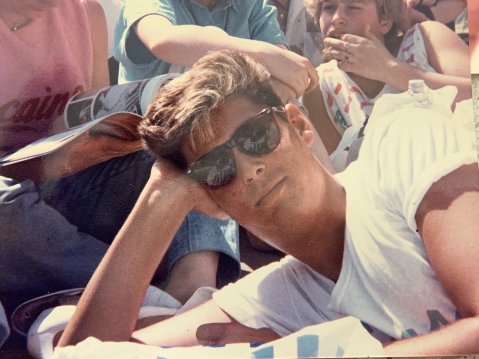 A young Raoul Pal in sunglasses at an outdoor event