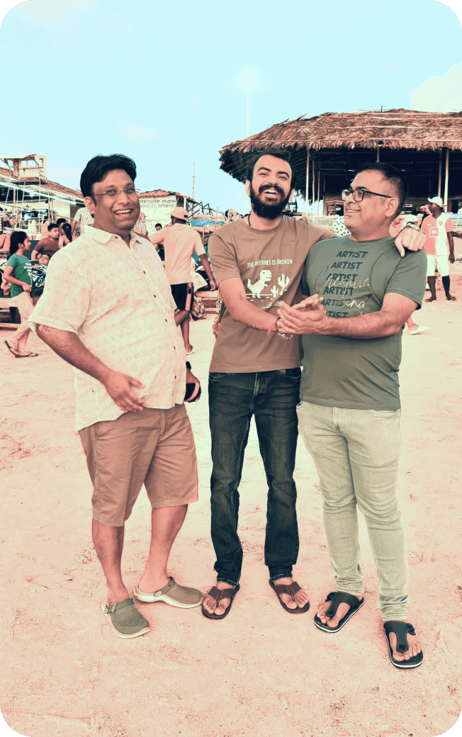 Three people posing together in a Salesmate office culture photograph