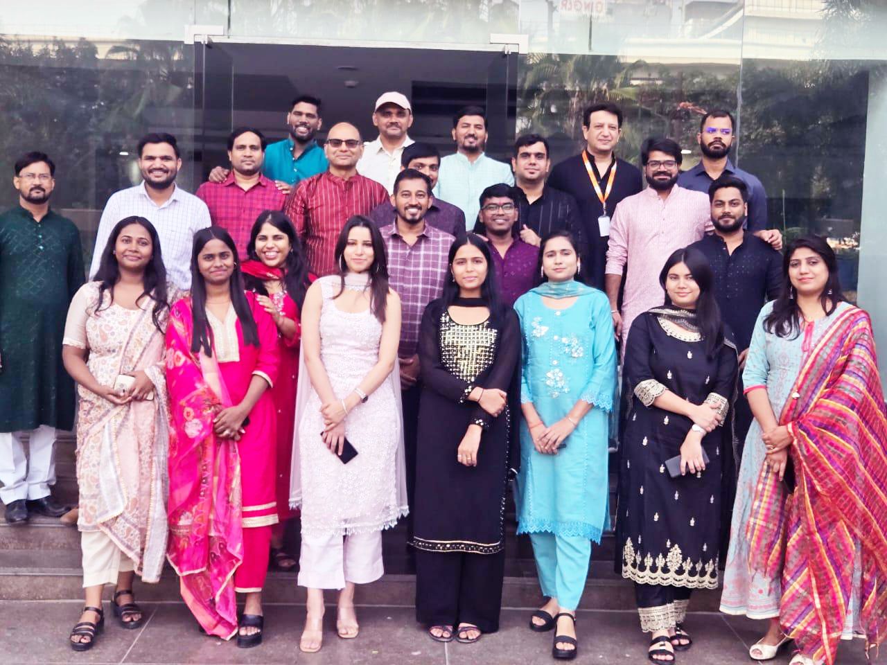 Ratna Global Tech employees gathered for a team photograph