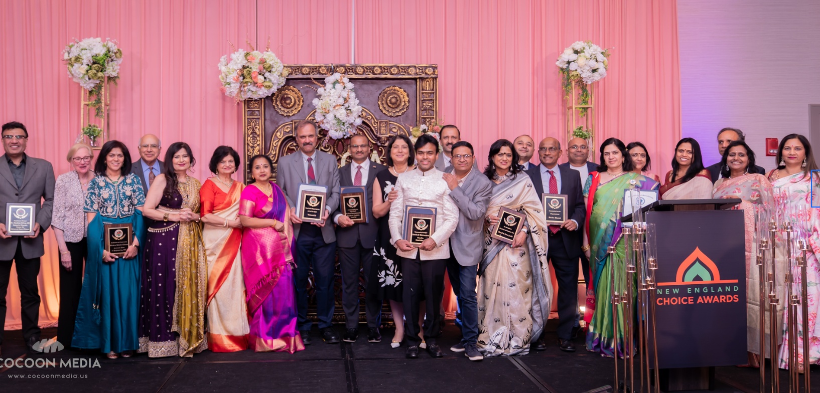 Award recipients and guests standing together at the 2024 New England Choice Awards gala