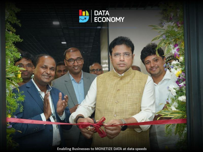 Ravi Kopuri, at left in a blue jacket, with Telangana minister D. Sridhar Babu and DATAECONOMY leaders at the Hyderabad delivery-center inauguration