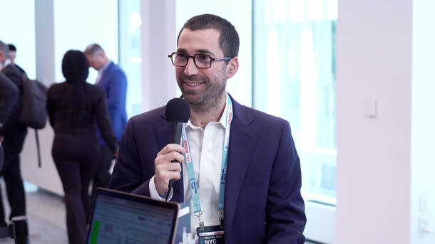 Raviv Pryluk speaking during a conference interview in New York