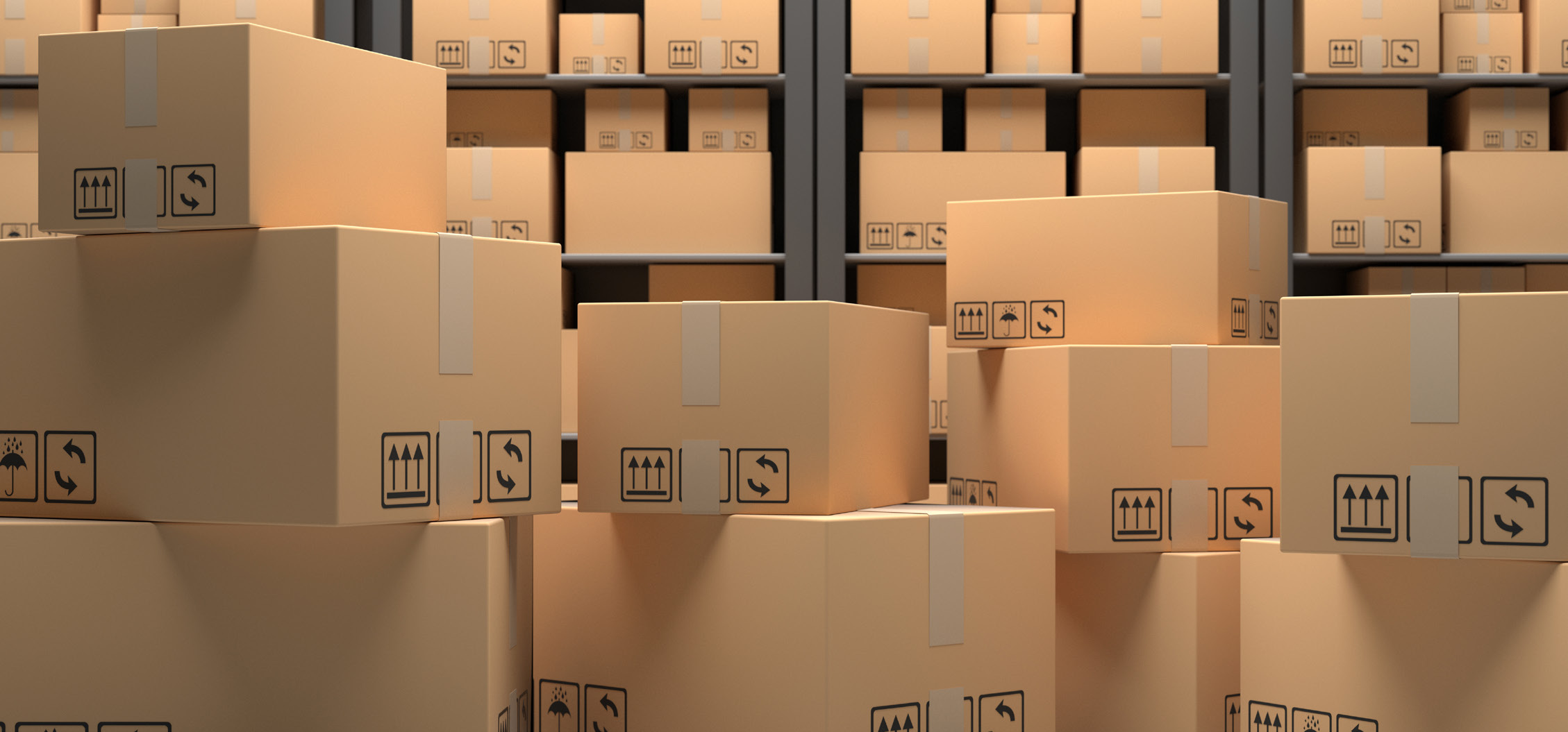 Cartons stacked in front of warehouse shelving