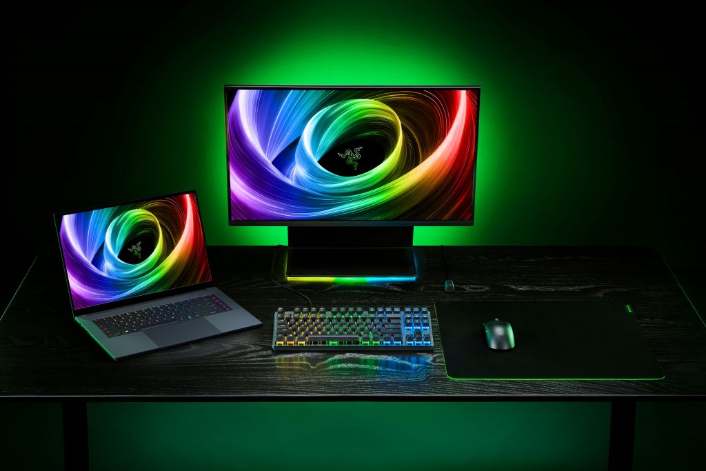 A Razer gaming setup with laptop and peripherals