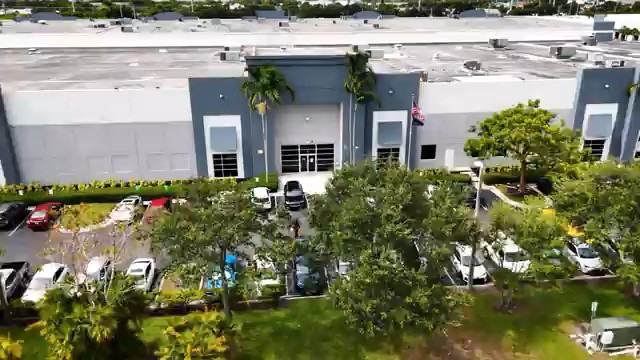 Aerial view of the Reagan Wireless warehouse building in Deerfield Beach, Florida