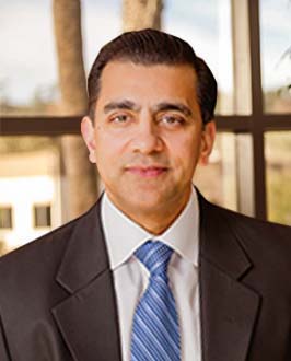 Portrait of Realty Income President and CEO Sumit Roy
