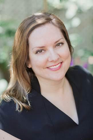Archival photograph of Rebecca Reeve, wearing black, outdoors