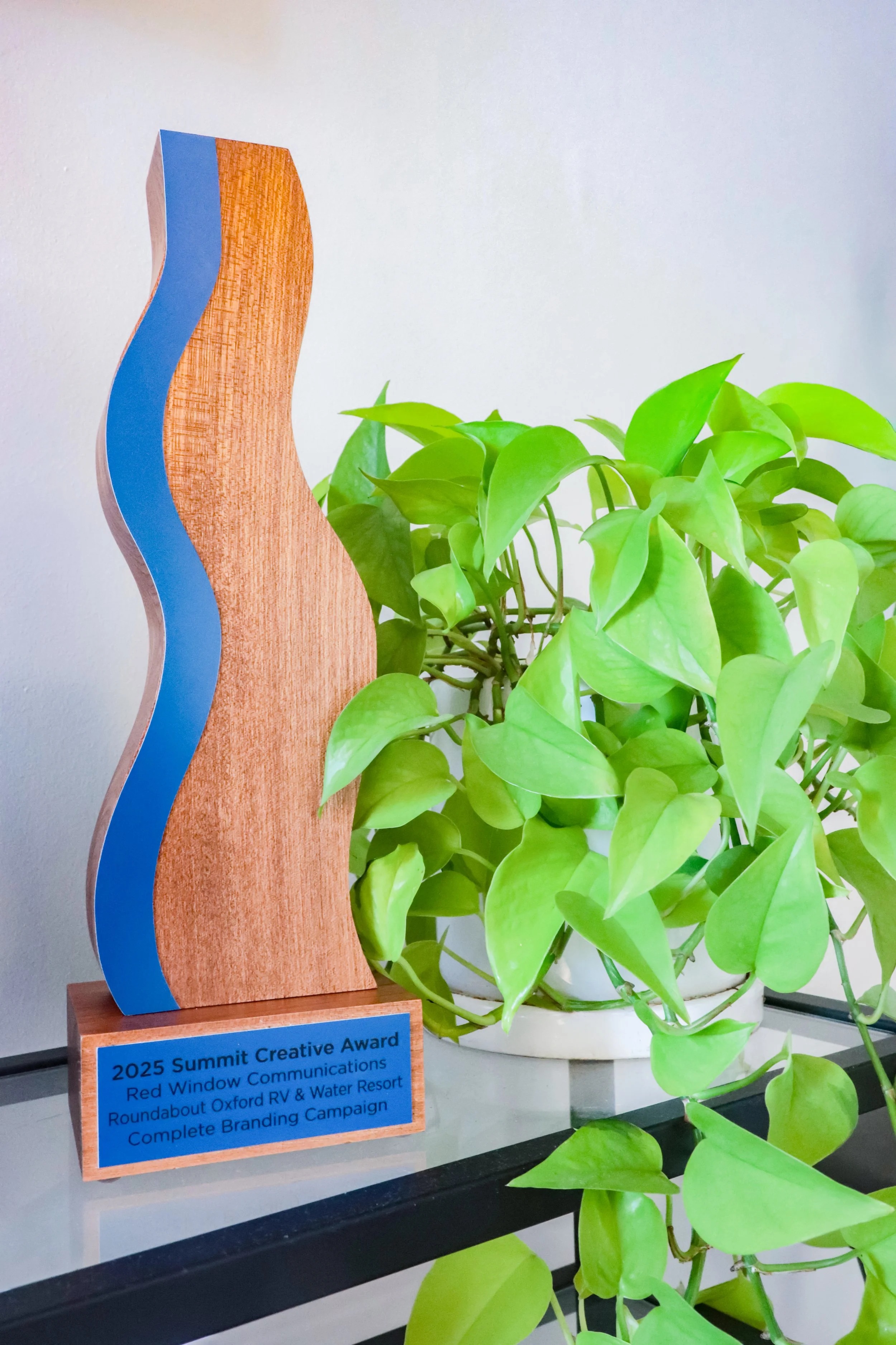 Summit Creative Award trophy recognizing Red Window Communications' campaign work