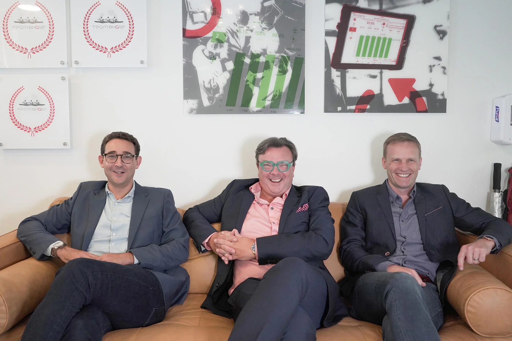 Redzone's three founders seated together in an office