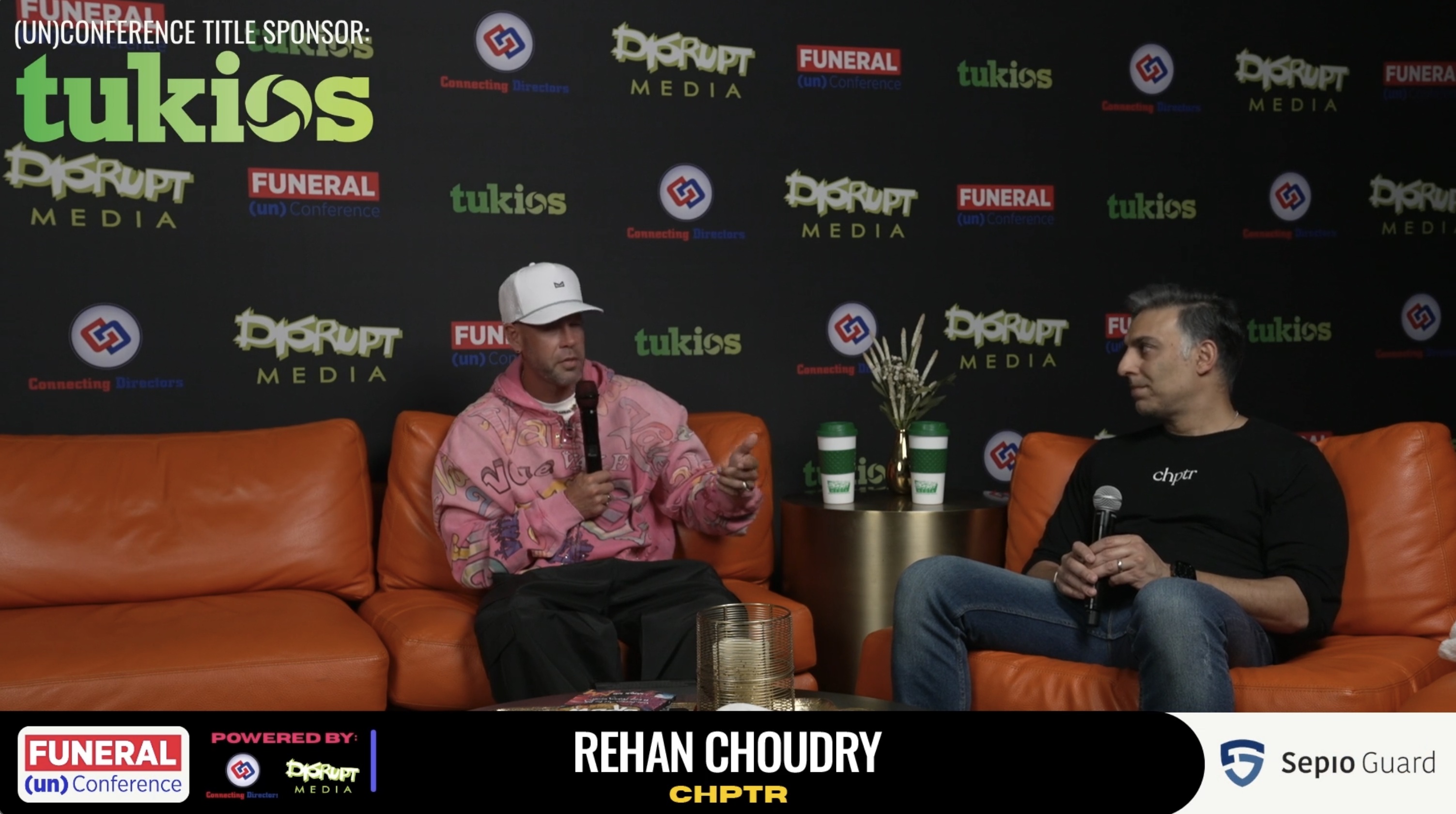 Ryan Thogmartin interviews Rehan Choudhry, seated at right, at the 2026 Funeral (Un)Conference.