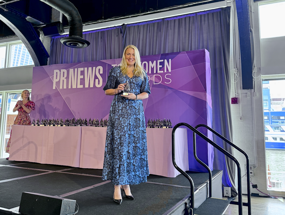 Suzanne Rosnowski receiving a PRNEWS Top Women in PR award in 2025