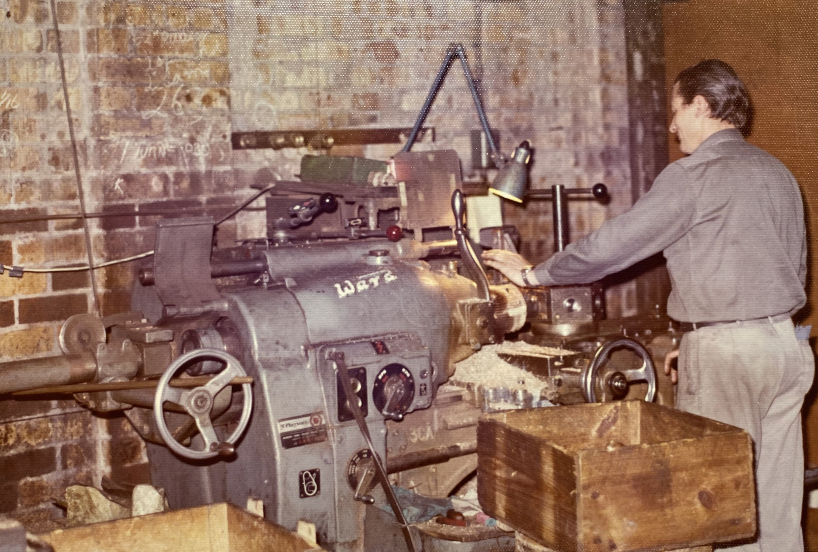 Archival RWC photograph of a machinist at work