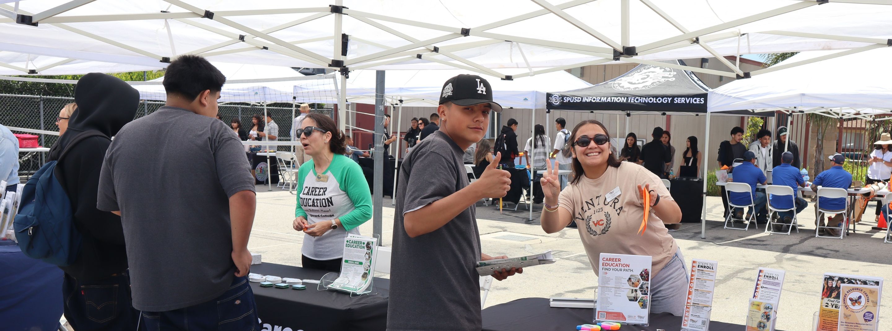 Students visiting career and education booths at Renaissance High School