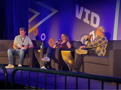 Rene Ritchie speaking with Gwen Miller and Todd Beaupré on a panel at VidCon 2024