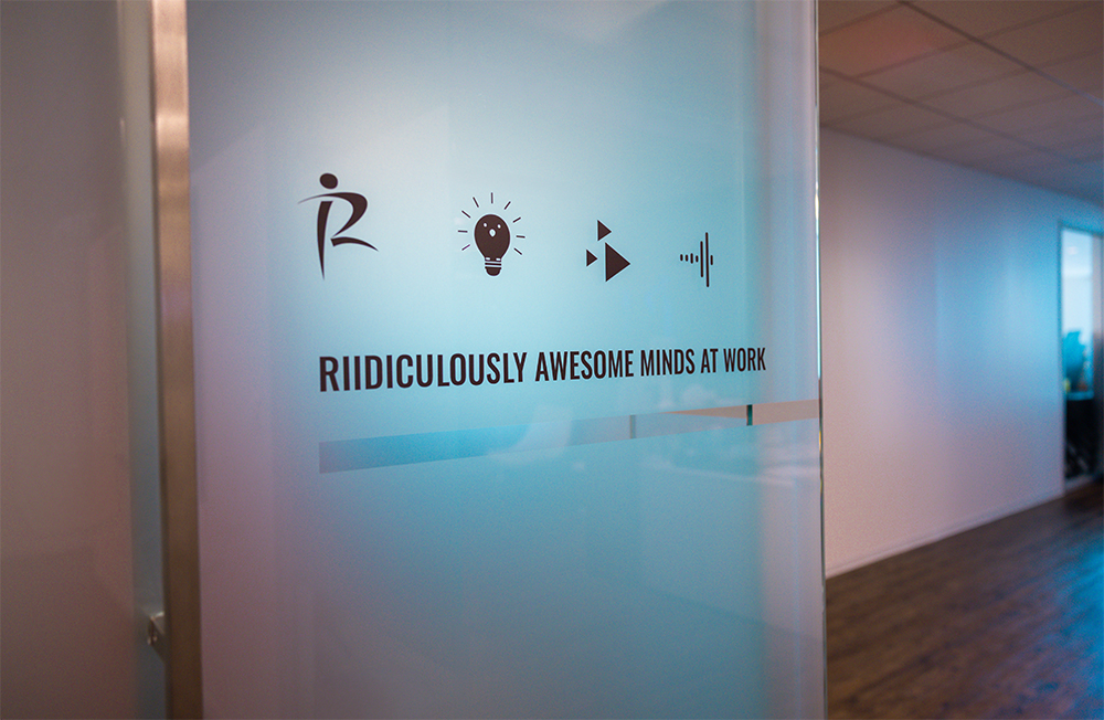 RII’s published workplace photograph of employees collaborating