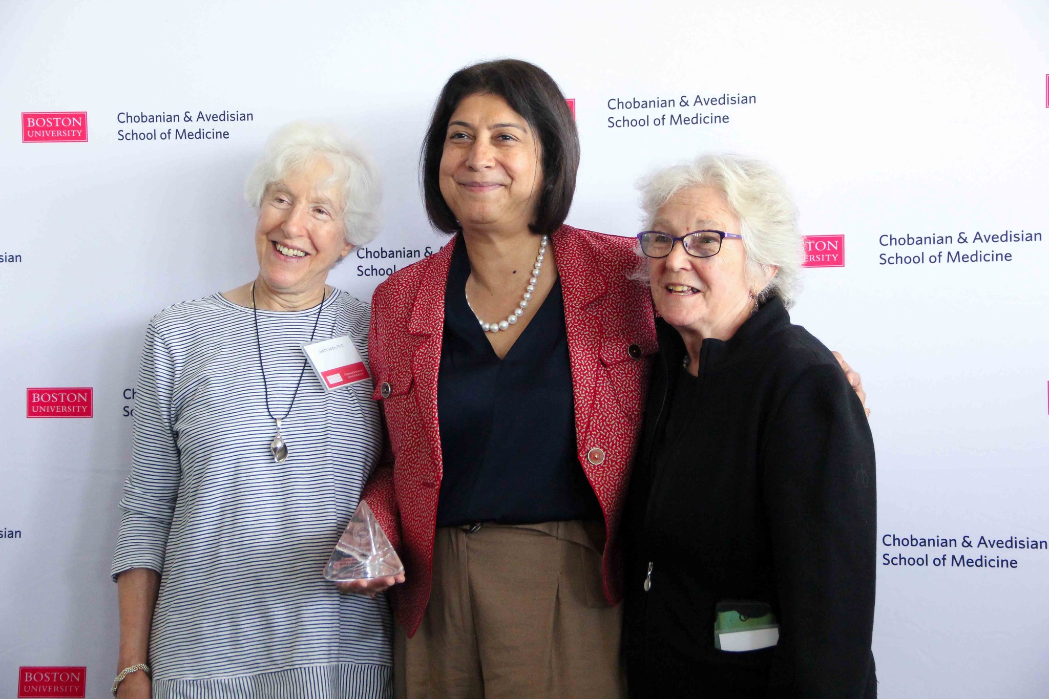 Reshma Kewalramani between her Boston University mentors Judith Saide and Vickery Trinkaus-Randall