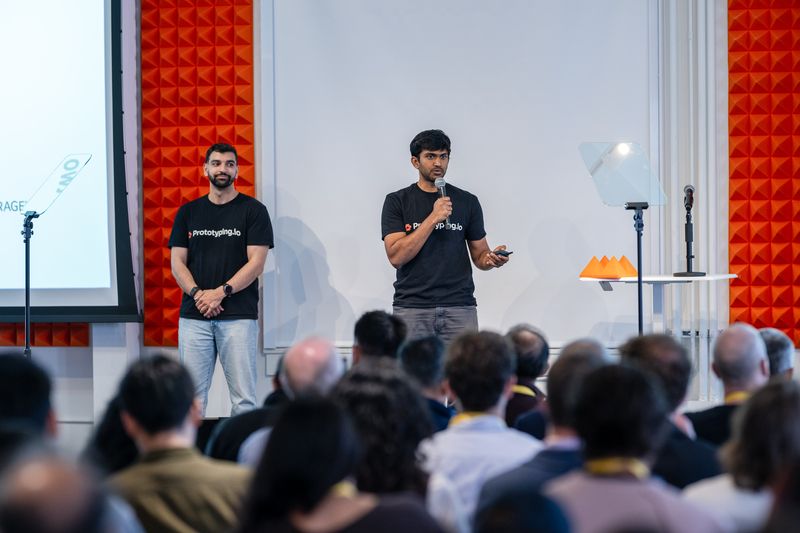 Revanth Bodepudi and Prerit Oberai presenting Prototyping.io onstage at Y Combinator Demo Day