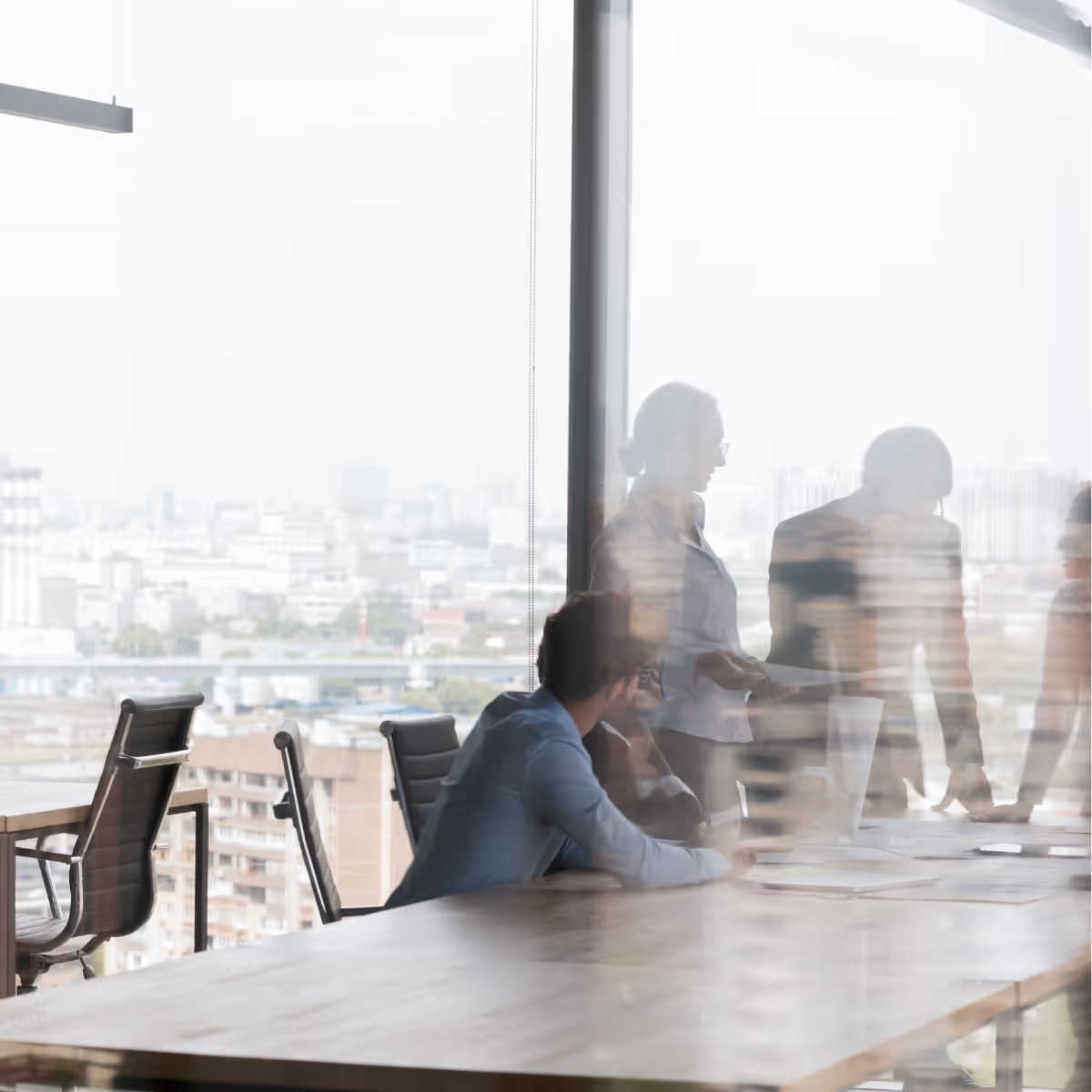Office meeting photograph used on Reveal’s company website
