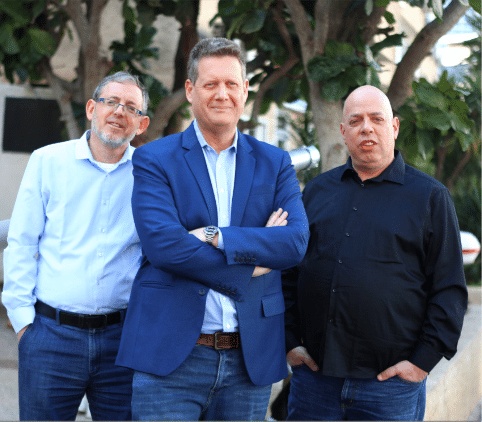 Reveal Security co-founders David Movshovitz, Doron Hendler and Adi Degani, standing outdoors
