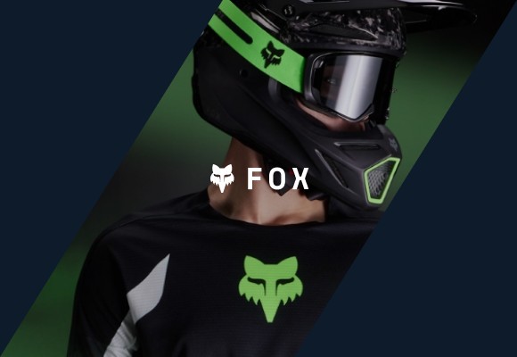A rider in Fox Racing moto gear, helmet and goggles