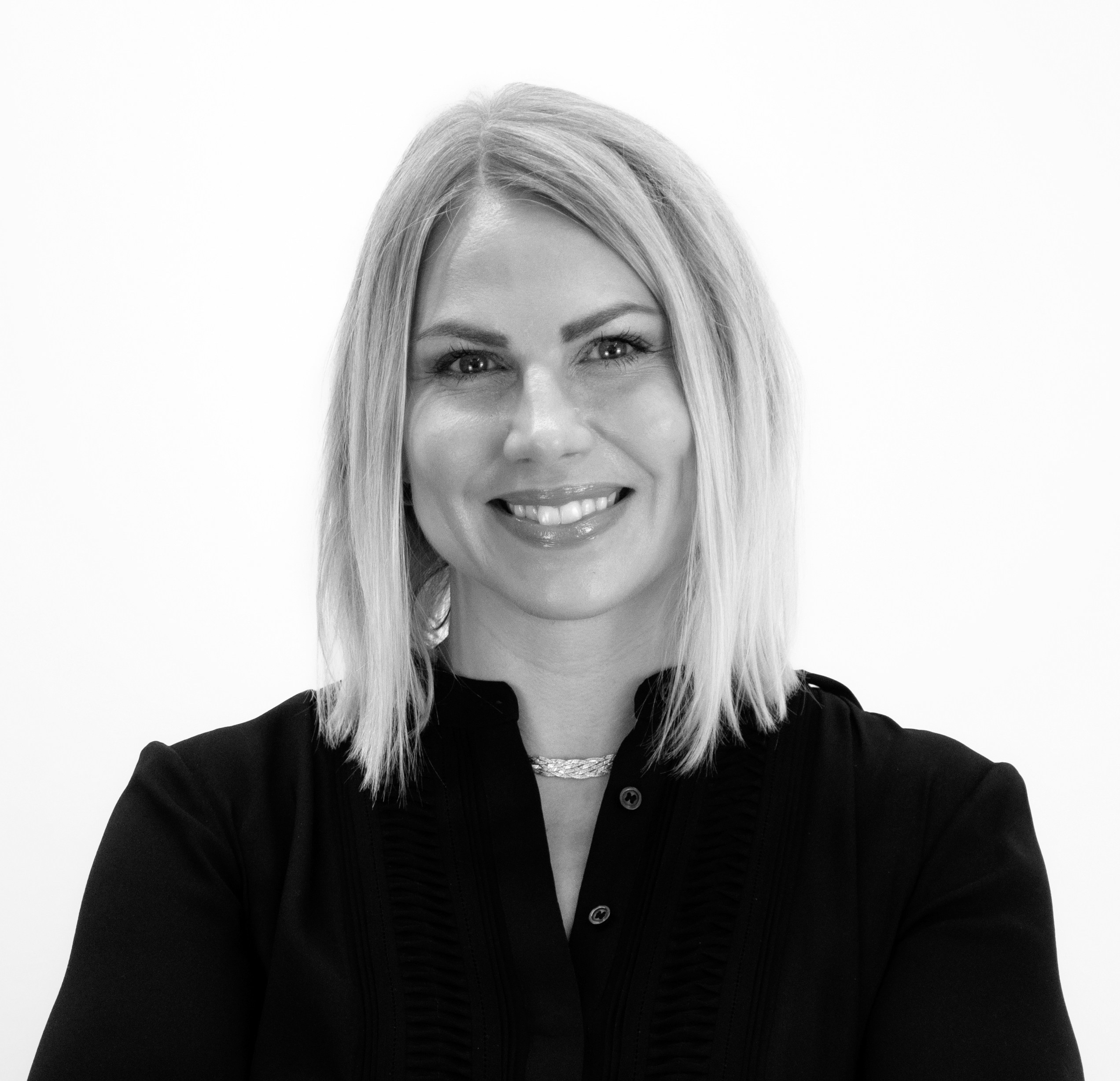 Black-and-white press portrait of Rhiannon Naslund