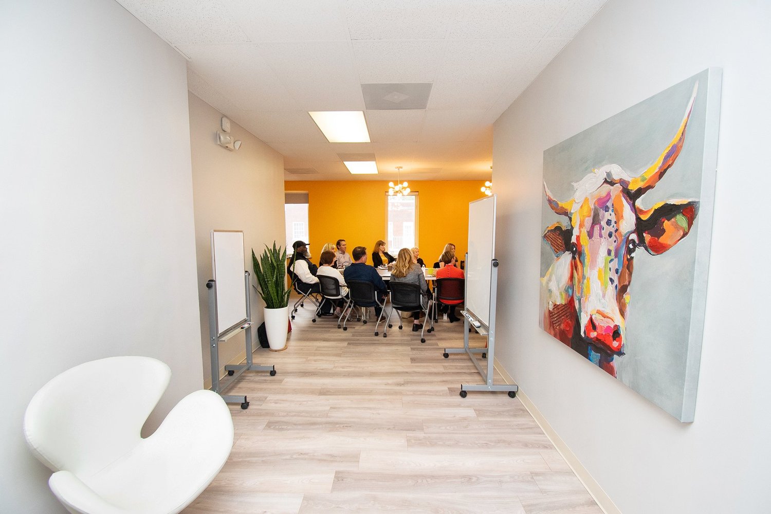 Members of the Rhudy and Co. team together in their Richmond office