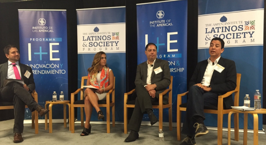 Ricardo Mora, seated at right, speaking on a four-person panel about innovation at the border
