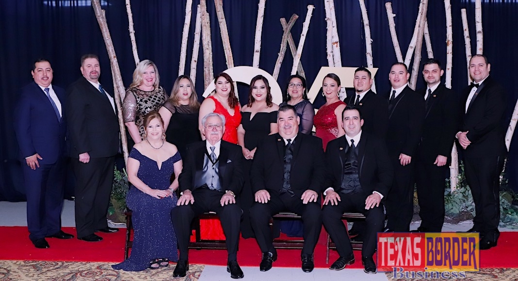 IBC Bank-Zapata officers at the 2019 anniversary celebration. Ricardo Ramirez is seated third from left beside his father, Renato, second from left.