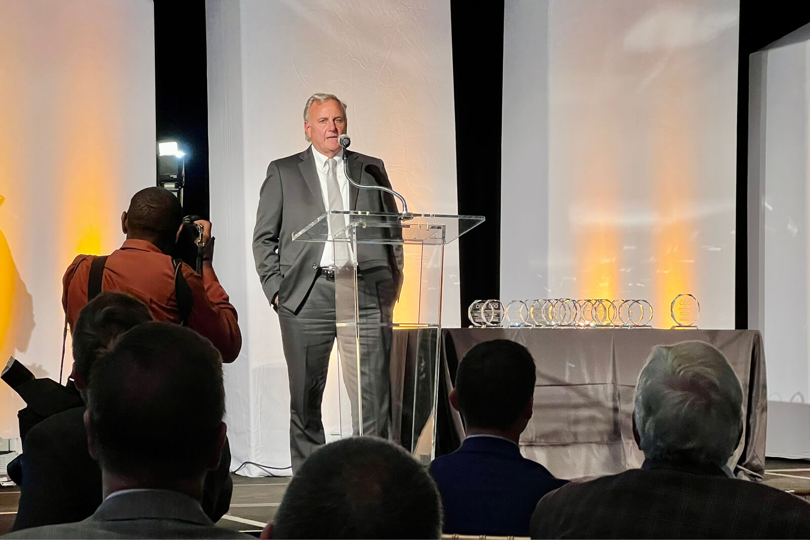 Rich Stinson speaking at a lectern during the 2022 Most Admired CEO awards