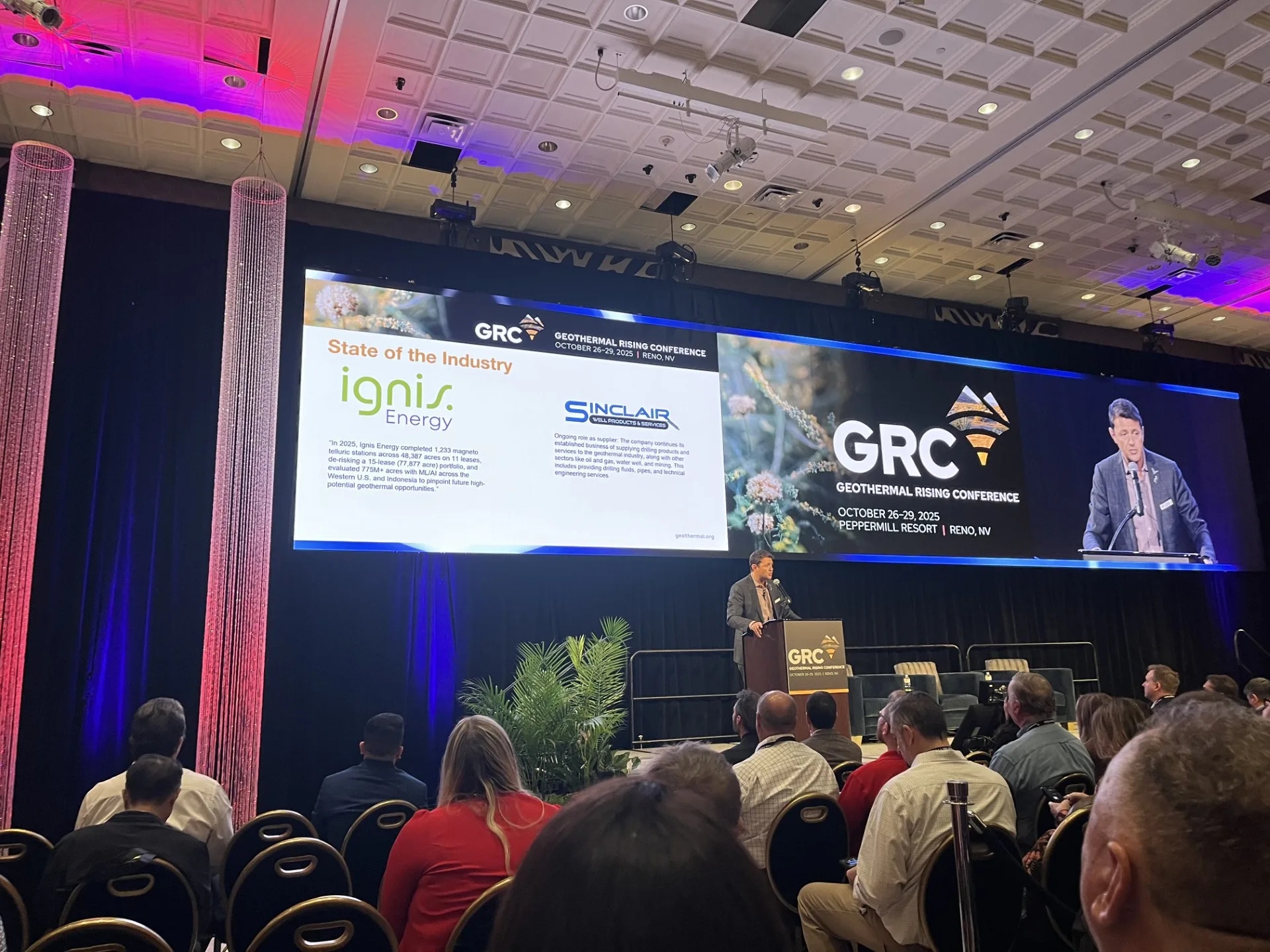 Bryant Jones addresses the 2025 Geothermal Rising Conference in Reno while an Ignis project update appears on screen