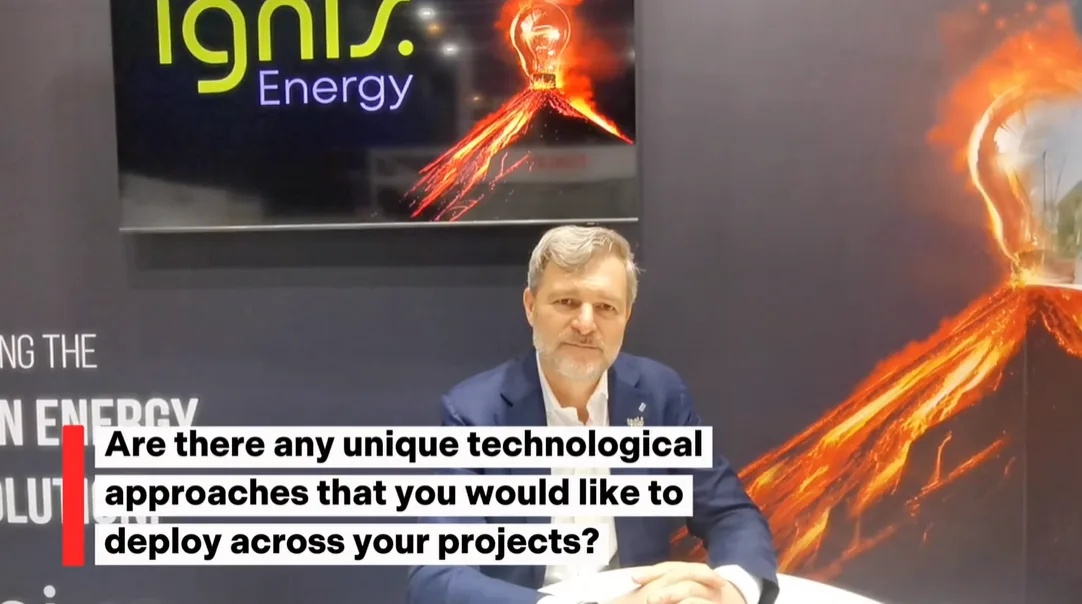 Richard Calleri seated at the Ignis stand during his ThinkGeoEnergy interview